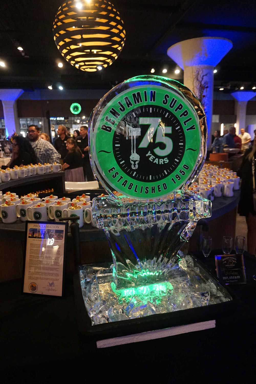 Benjamin Supply 75th Anniversary ice sculpture glowing green.