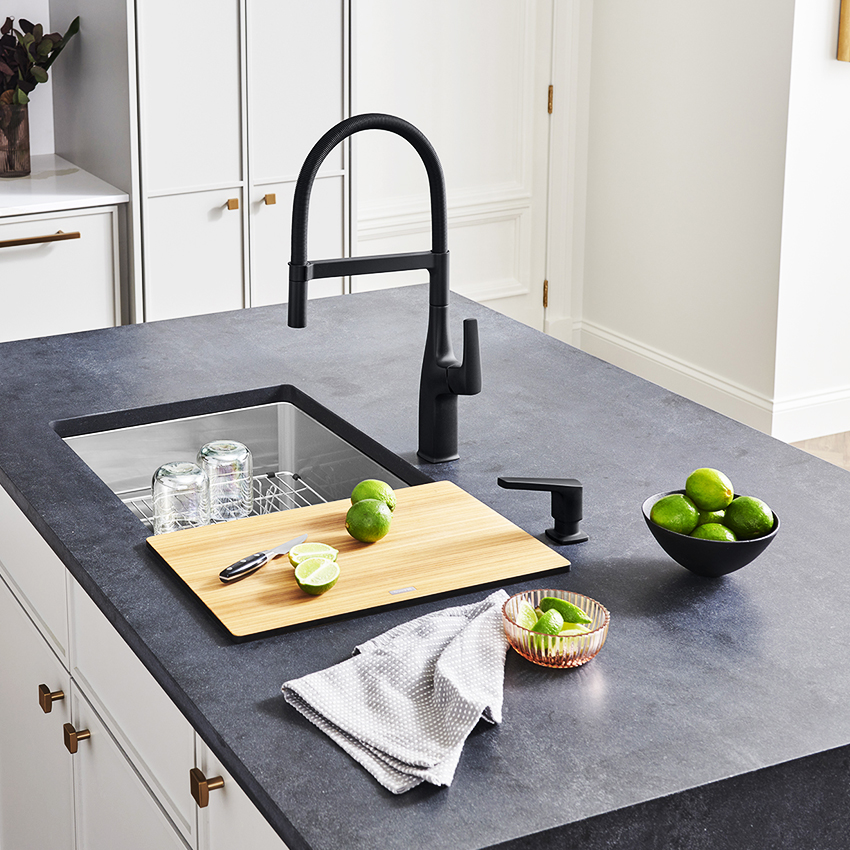 A black faucet with accessories
