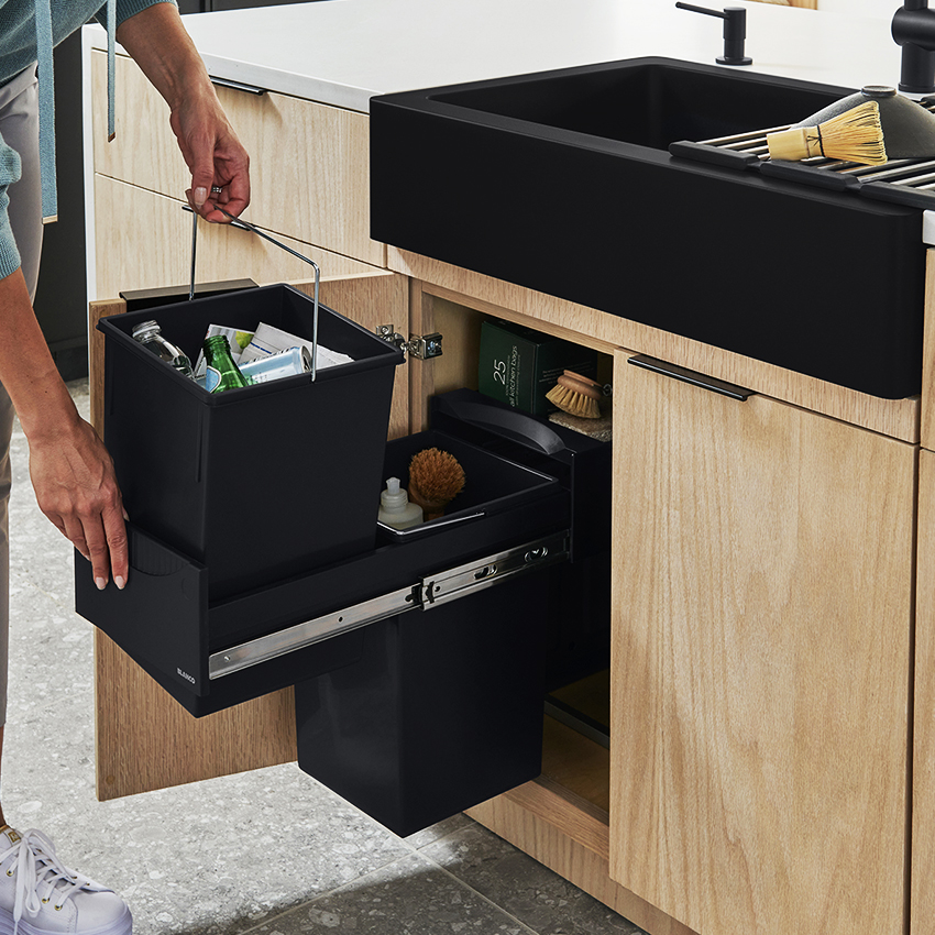 A kitchen with a storage system