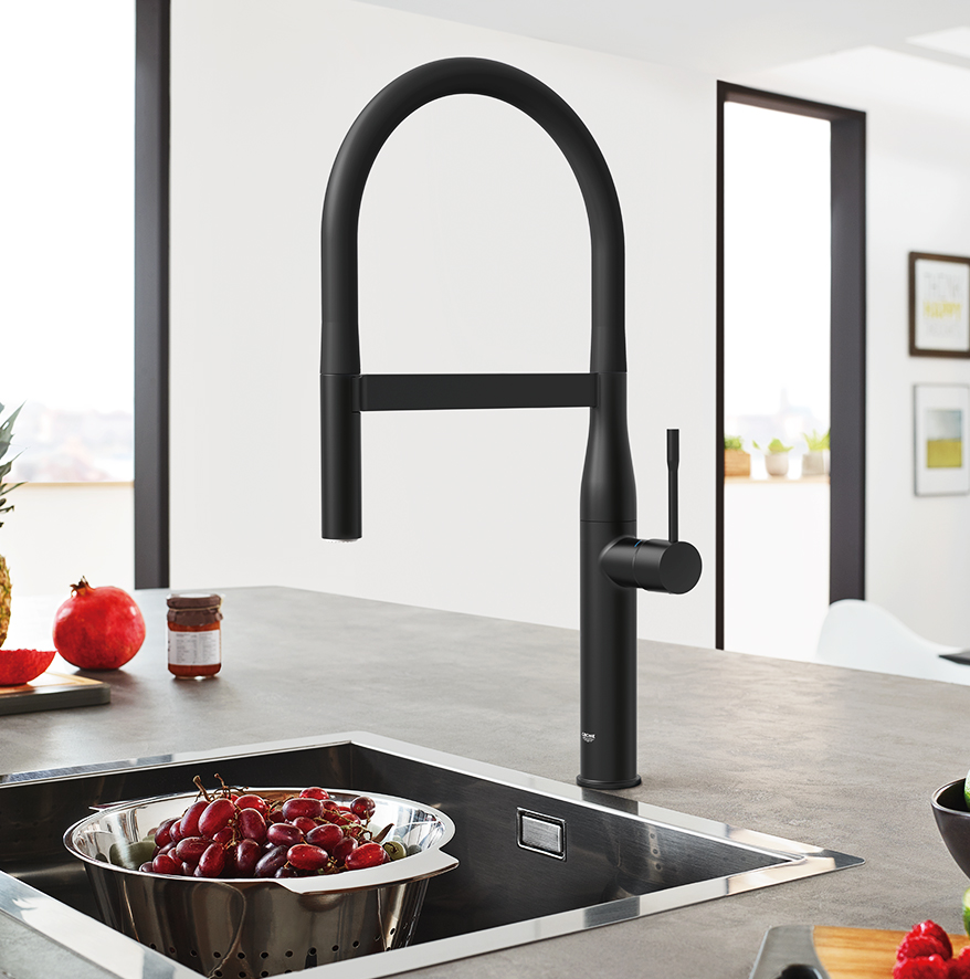 A black matte kitchen faucet