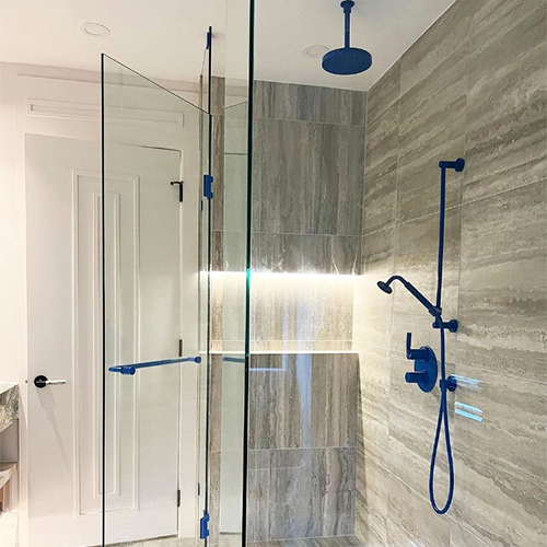 Shower faucet set as well as Rubinet accessories in denim blue finish