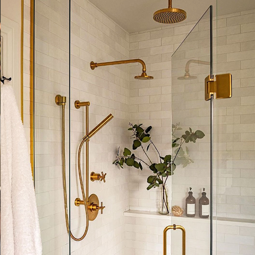 Shower faucet set as well as Rubinet accessories in brass finish
