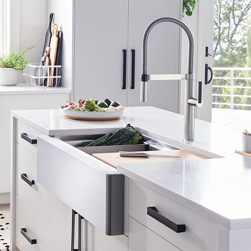 Quatrus R15 single bowl stainless steel apron sink, Culina faucet and Blanco colander with drainboard and cutting board