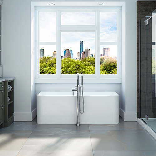 Freestanding bathtub from the Belgrade collection by Produits Neptune with a white finish