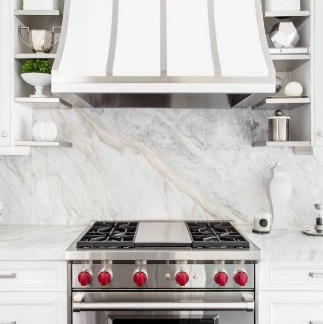 Stylish kitchen featuring a colorful tile backsplash with modern subway-inspired design.