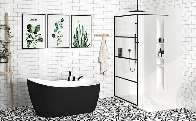 A bathroom with a black bathtub and a shower