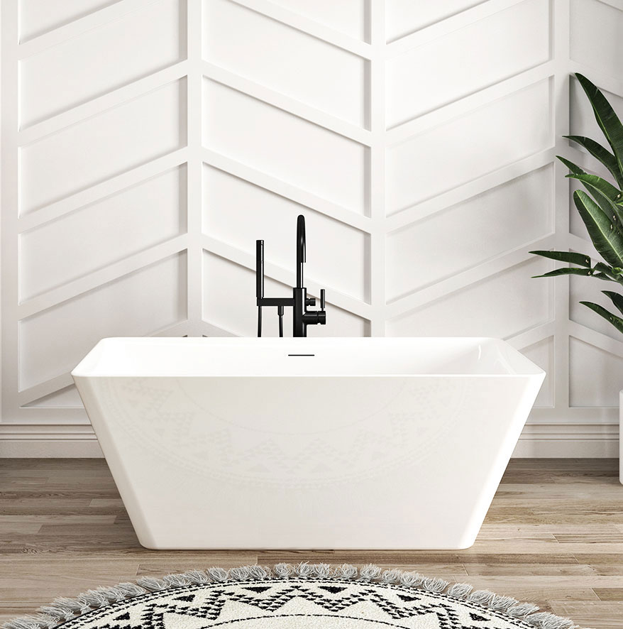 Une salle de bain avec une baignoire blanche et aux courbes arrondies  