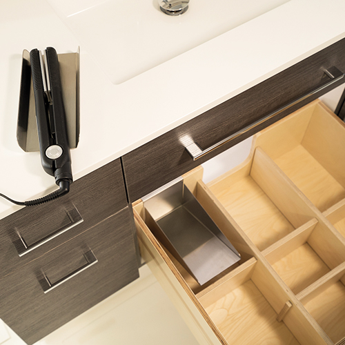 Drawer divider with space for dryer, flat iron or other
