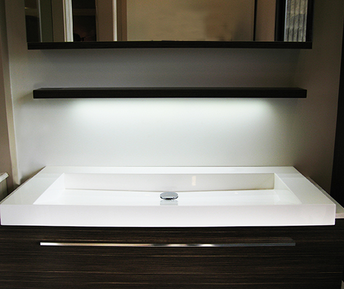 Shelf with concealed LED light underneath