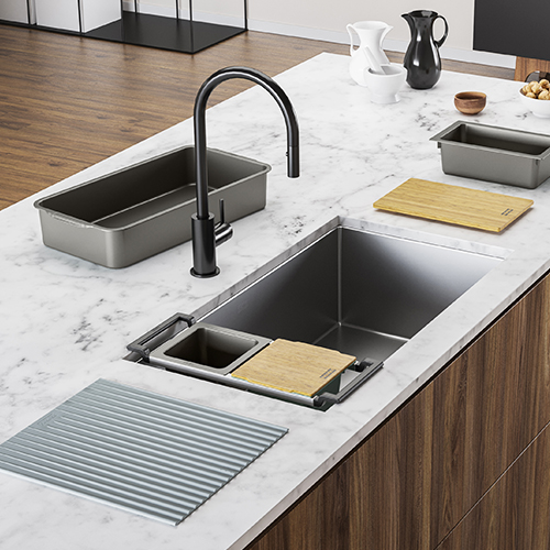 Kitchen sink from the Franke Cube collection in stainless steel and its kitchen accessories