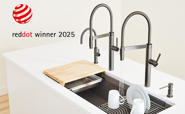 Two black kitchen faucets with a bar faucet and a soap dispenser.