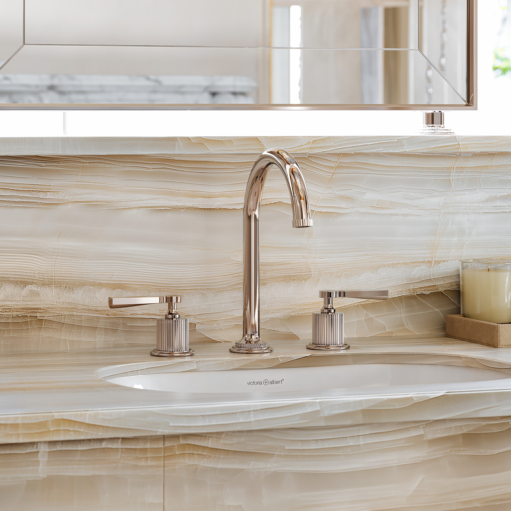 Bathroom faucet with a white sink.