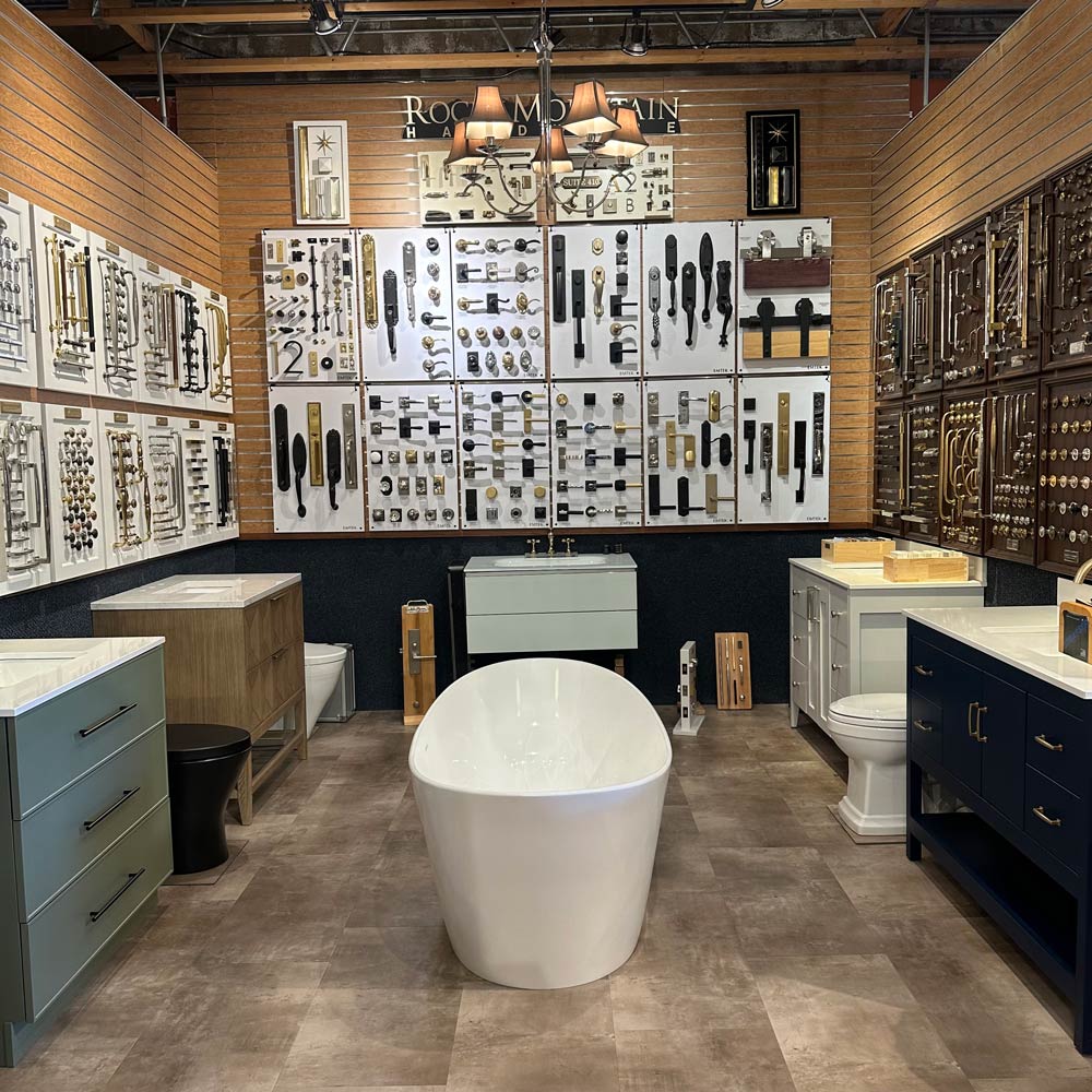 A bathroom featuring a bathtub, sink, and storage cabinets, showcasing a clean and organized space.