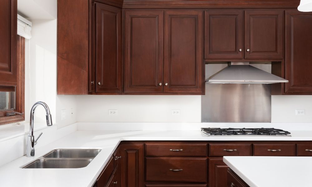 Kitchen with rich dark wood cabinetry