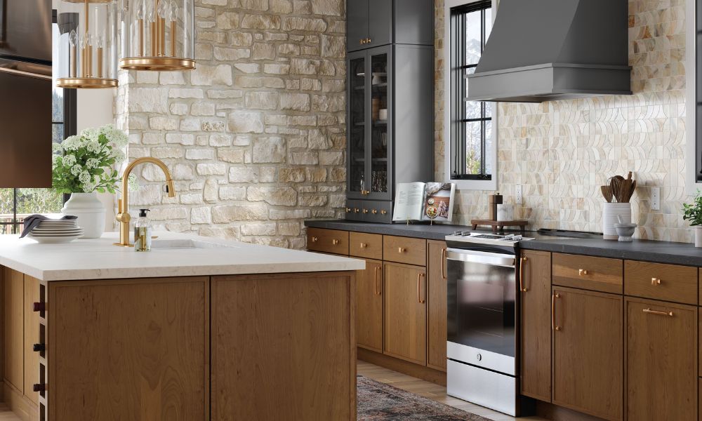 A modern Tuscan kitchen with stone walls and wood cabinetry