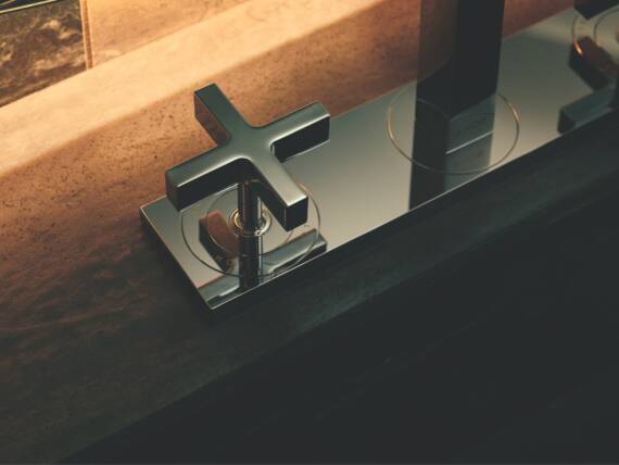 AXOR Citterio 3-hole wash basin faucet with cross handles.